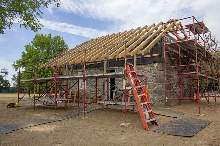In-progress roof with scaffolding